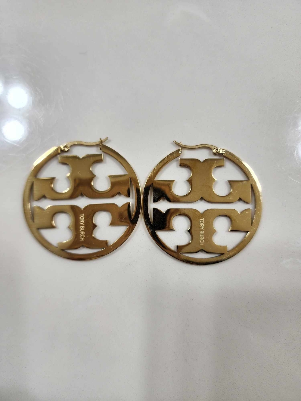 Tory Burch Polished Gold Logo Cutout Hoop Earrings